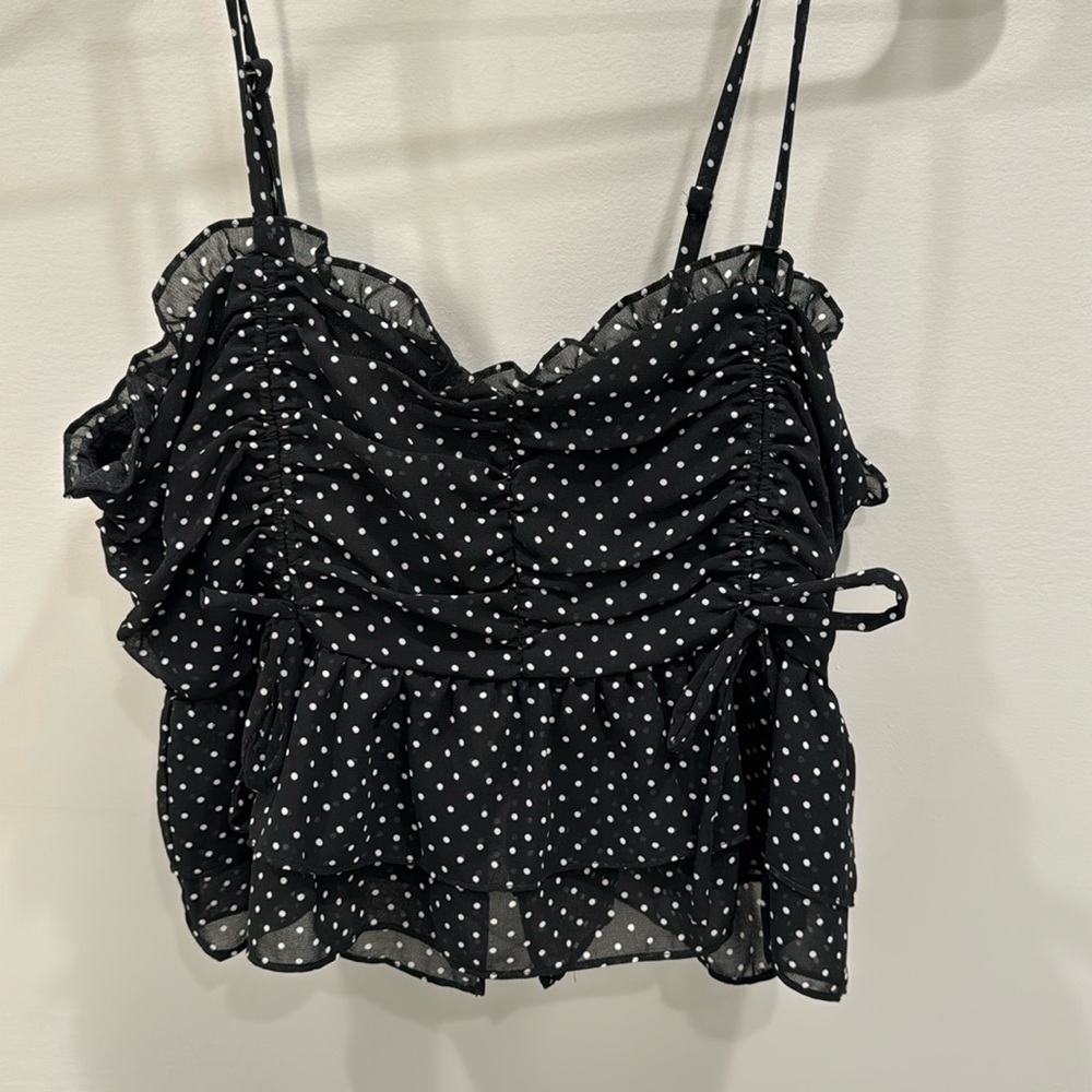 Black and white polka dot mini shirt with ruffles